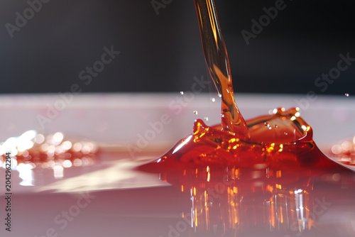 Foto Cough syrup is an oral medication formulated to soothe throat irritation, suppre