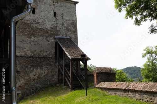 Bild auf Leinwand Medieval Citadel Fortress Wall with Covered Wooden Staircase