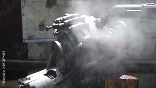 cleaning and washing with a steam cleaner of an old manual transmission from a front-wheel drive car for repair