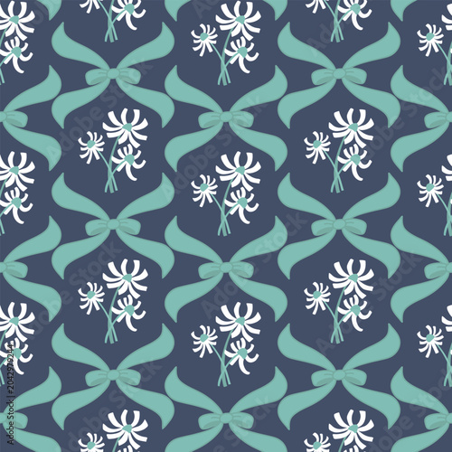 Elegant seamless floral pattern featuring stylized white daisies, flowing mint green bows, and decorative botanical elements on a deep blue background. Vintage-inspired repeating design with a soft pa