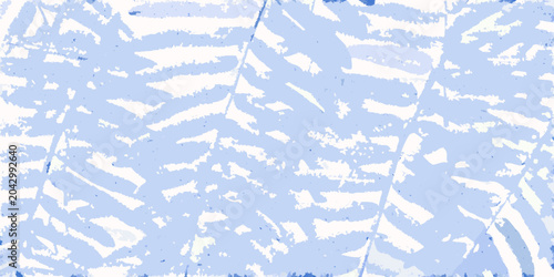 Fotografia fern frond pattern on light blue background