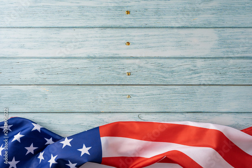 American flag on weathered wood background for USA Independence Day celebration and patriotic decor