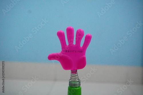 Konstfotografi Mini plastic hand clap toy candy combines playful spring-action clapping fun with sweet confectionery treats