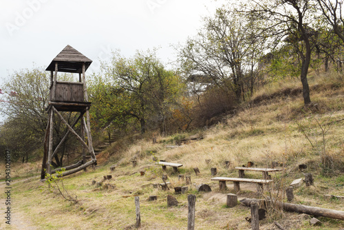 Принти на полотні Low angle view of rustic wooden watchtower structure within the reconstructed Cossack fortress on