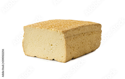 Tofu Cheese Isolated, Smoked Vegan Cheese Slice, Sliced Soya Bean Curd, Soy Protein or TSP