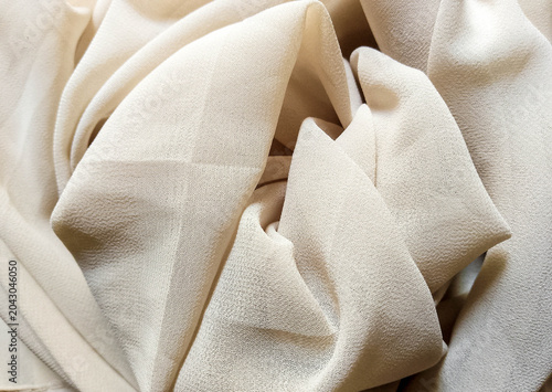 Schilderij op canvas Close-up of crumpled beige towel texture