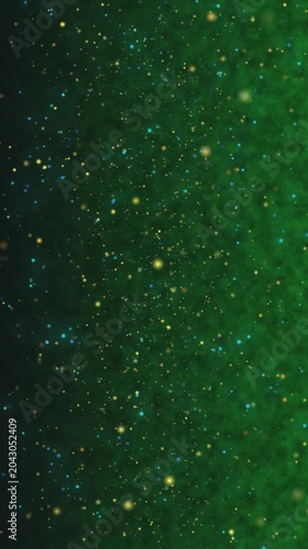 A mesmerizing abstract background featuring a deep green nebula with a scattering of bright golden stars and particles.