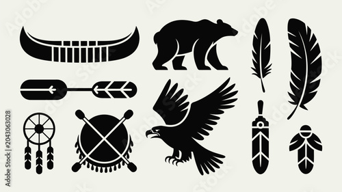 Set of indigenous tribal icons featuring canoe bear eagle feather and dreamcatcher symbols.