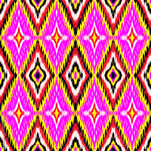 Abstract traditional ikat ethnic geometric seamless pattern on pink tones wallpaper textiles, background. Tribal print design art.