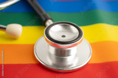 Foto Stethoscope on LGBT rainbow flag, rights and gender equality.