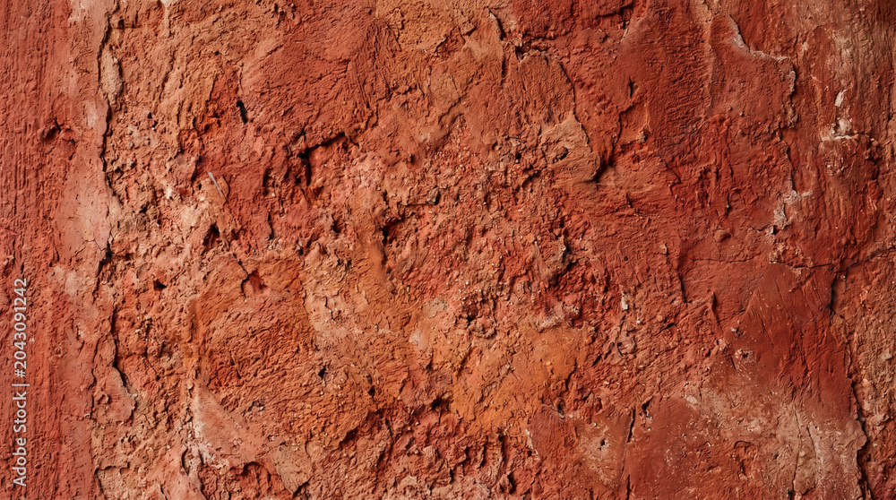 Fototapeta premium Dark red stucco wall texture background