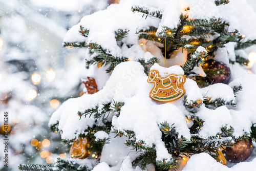 Close-up. Beautiful horse on a Christmas tree. Beautiful Christmas background. Concept of preparing for the New Year. New Year's postcard 2027.