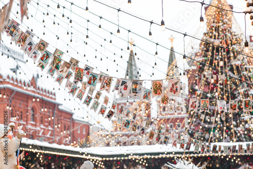 View of Red Square with a New Year's tree. Christmas street decorations. Beautiful festive cityscapes. Decorated Christmas trees. New Year's winter holidays 2027. Moscow