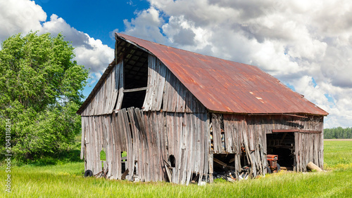 Vászonkép Scenic rural landscape with a rundown barn in northern Missouri countryside