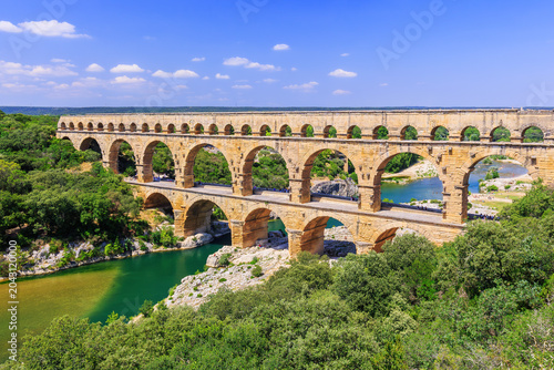 Fotografie Nimes, France. Ancient aqueduct of Pont du Gard.