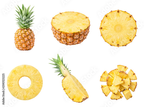 Photos Vibrant collection of fresh, juicy pineapple, presented whole, expertly sliced into rings, quartered, and diced