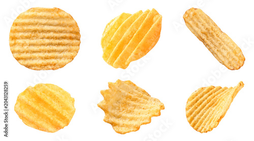 Fotografie Assortment of crisp, wavy potato chips in various forms and textures, isolated on a transparent background