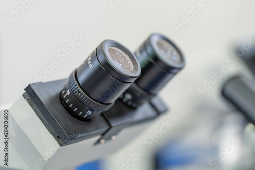 Fotografie Close up view of eyepiece on binocular laboratory microscope
