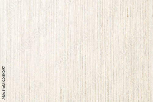 Minimalist light beige wood texture background with vertical natural grain patterns, clean and bright surface for interior design, product mockup, or digital wallpaper.
