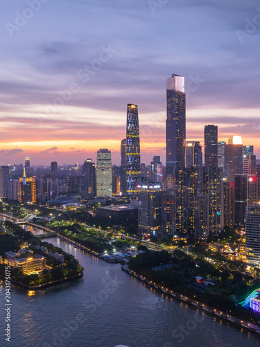 Aerial View of Guangzhou Skyline at Sunset with River Reflection
