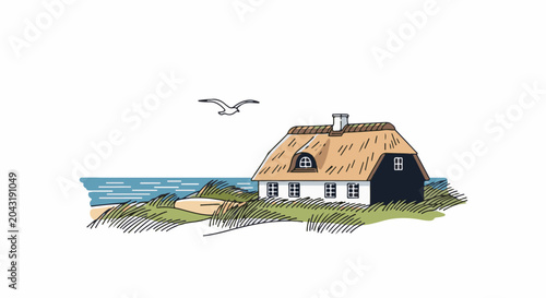 A quaint cottage with a thatched roof sits beside a serene ocean and sandy dunes