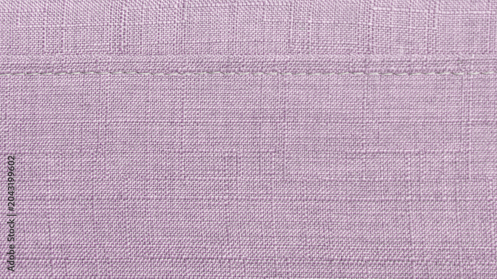 Fototapeta premium Light Pink textile background with fiber detail and stitching