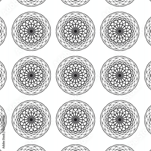 ​Minimalist black mandala seamless pattern. Geometric circular tile background.