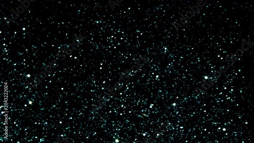 Green Sparkles Festive, glittering background of green sparkles, bokeh, and star particles floating and twinkling. For holidays or celebrations Green sparkles twinkle in the dark 4k