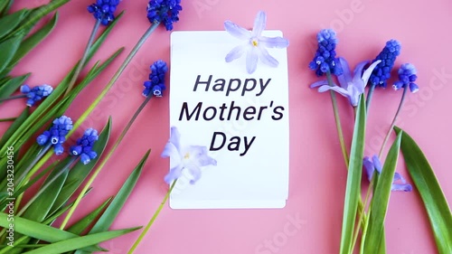 floral arrangement with thank you note on soft pink background