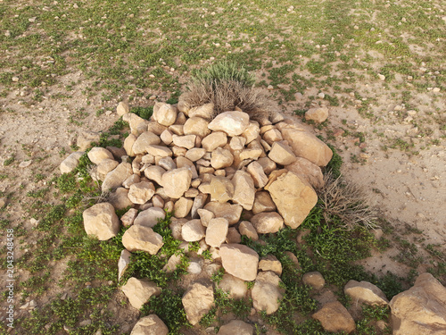 Фотография Pile of pale grey stones in rural countryside