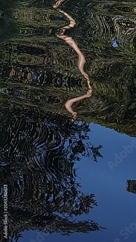 Natural Water Ripple Texture and Light Reflection, Clear River Water Surface with Sunlight Reflection Background