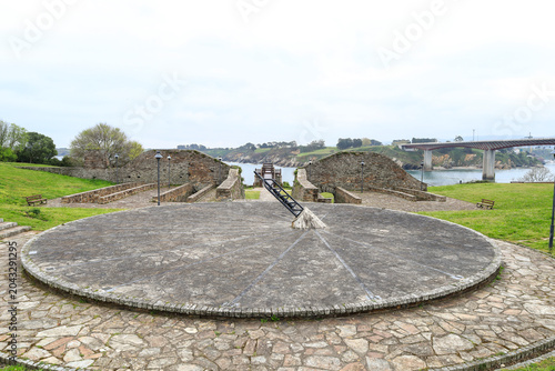 Big Stone sundial in The historic ore loading dock in Ribadeo town, known as O Cargadoiro