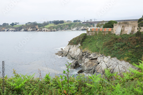 Antique San Damian Fortress and The Colossal Los Santos bridge over The Eo estuary in Ribadeo town