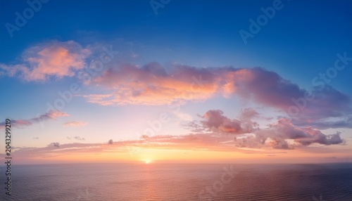 Gentle Morning Sky With Delicate Peach And Lavender Colors As The Sun Rises