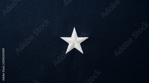 White star on navy background