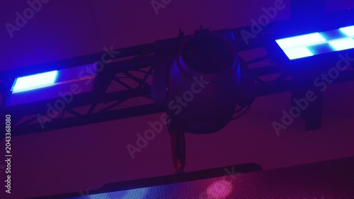Blue and Purple Stage Lighting Rig with Circular Microphone Shield