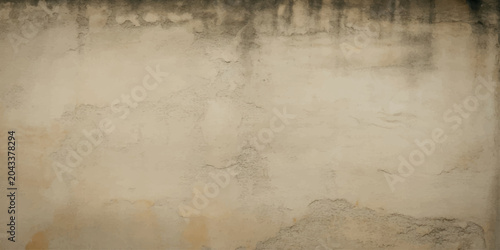 Konstfotografi A textured concrete wall displays signs of age and weathering, with streaks of dark discoloration and rough patches hinting at past stories