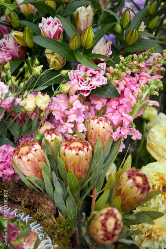 Stalls with flowers and bouquets at local street market