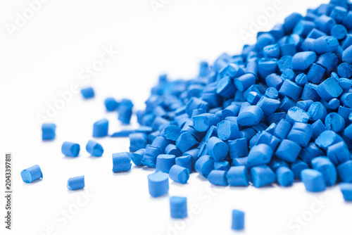 Heap of blue masterbatch granules. Masterbatch is a new type of colorant specifically for polymer materials