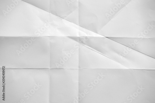 Foto folded crumpled white paper sheet background,Crumpled Paper Poster Photo Effect