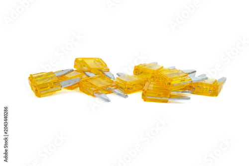 Pile of yellow fuse isolated on a white background . Repair