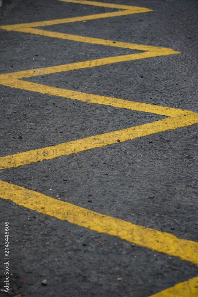 Fototapeta premium Yellow lines on asphalt road.