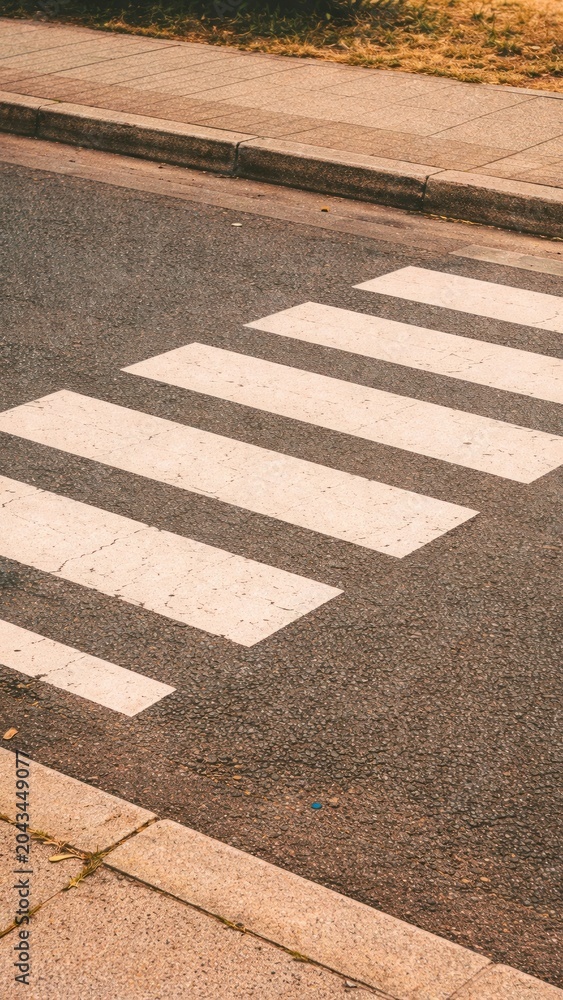 Obraz premium Urban crosswalk textured pavement mobile wallpaper