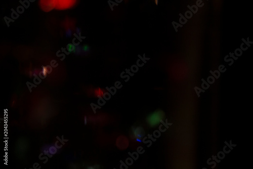 Abstract Dark Background with Colorful Bokeh Lights