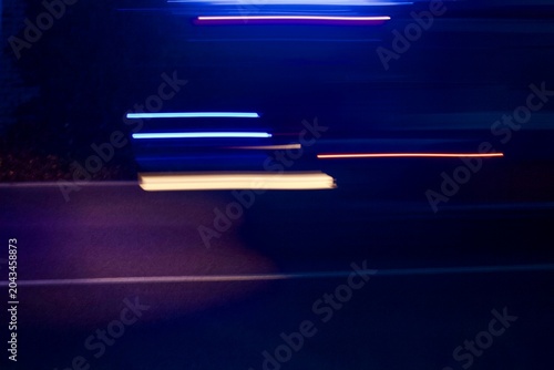 Foto Dynamic long exposure night traffic light trails capturing urban speed movement and energy for futuristic technology web banner advertising design