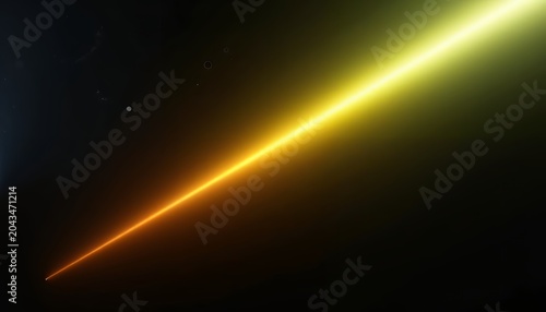 A bright yellow laser beam cutting through a dark background, with dust particles, in the air