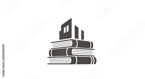 Foto Stack of books with building on top.