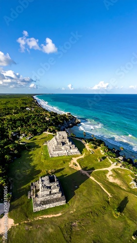 Ancient Stone Ruins Overlooking Turquoise Ocean on Tropical Coastal Cliffs