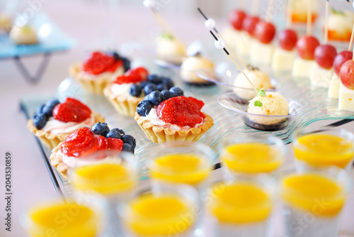 Gourmet mini tarts with fresh berries and desserts