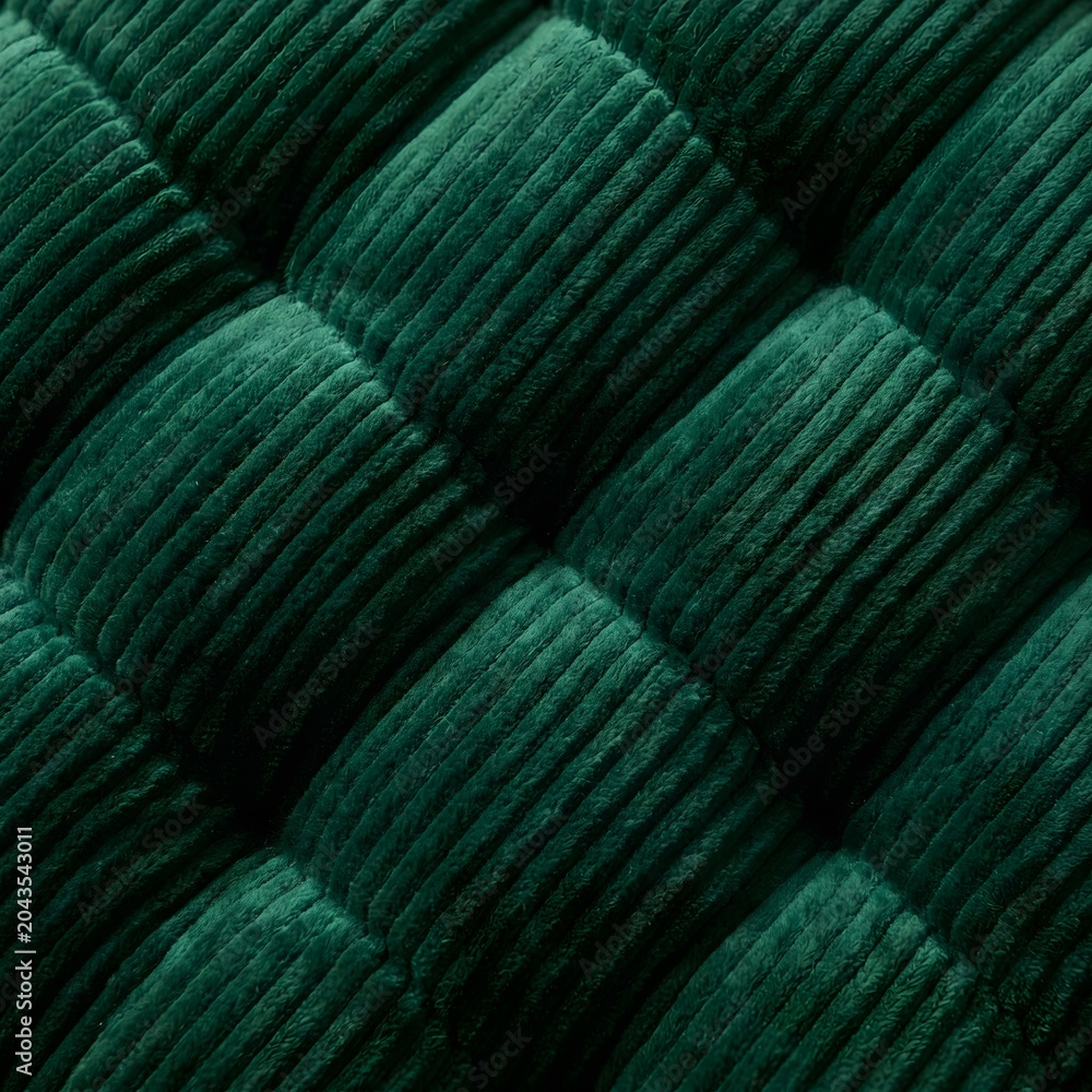 Naklejka premium Deep emerald green ribbed velvet upholstery texture